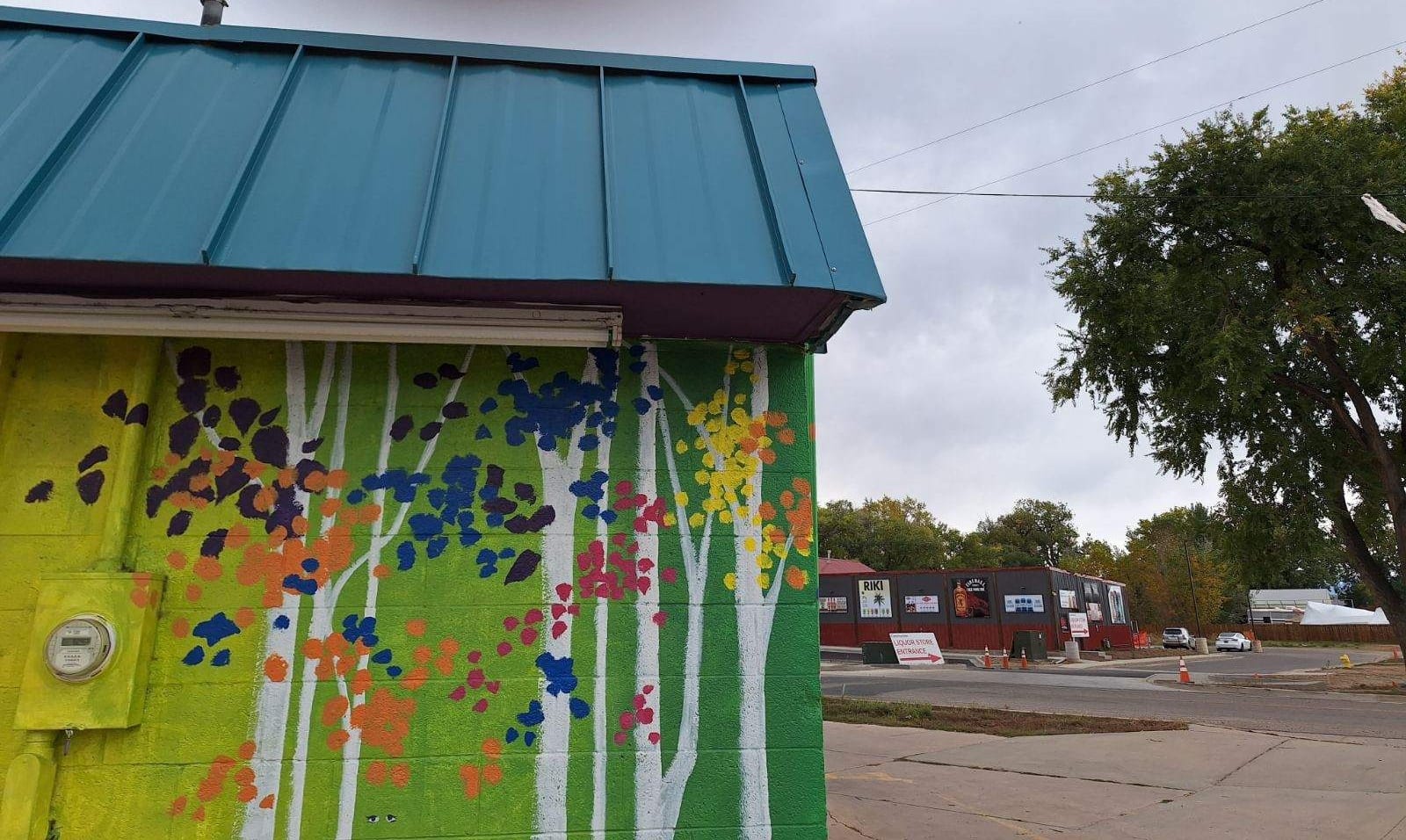 Colorful hand-painted mural on food cart — showcasing B-Rad's painting craftsmanship